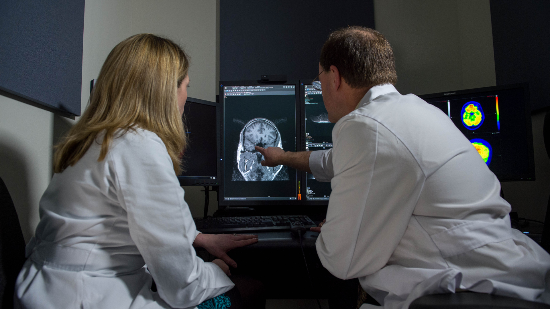 Photo of radiologists reading a brain scan