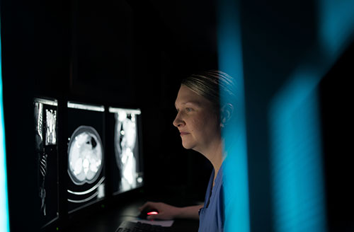 Photo of radiologist in PAH abdominal imaging reading room