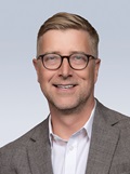 Headshot of Mark Sellmyer, MD, PhD