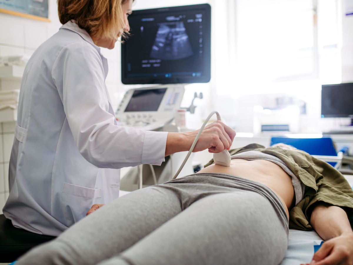 Photo of Abdominal ultrasound being performed