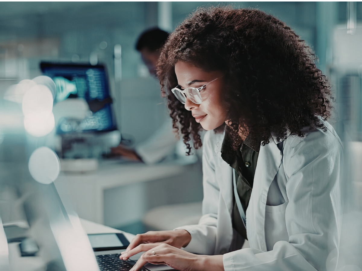 Radiologist working on a laptop