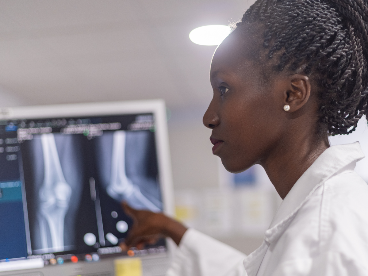 Radiologist reviewing scan of an ankle