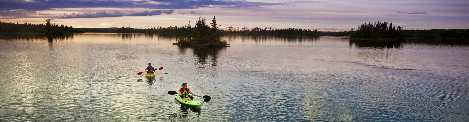 kayakers on a lake.