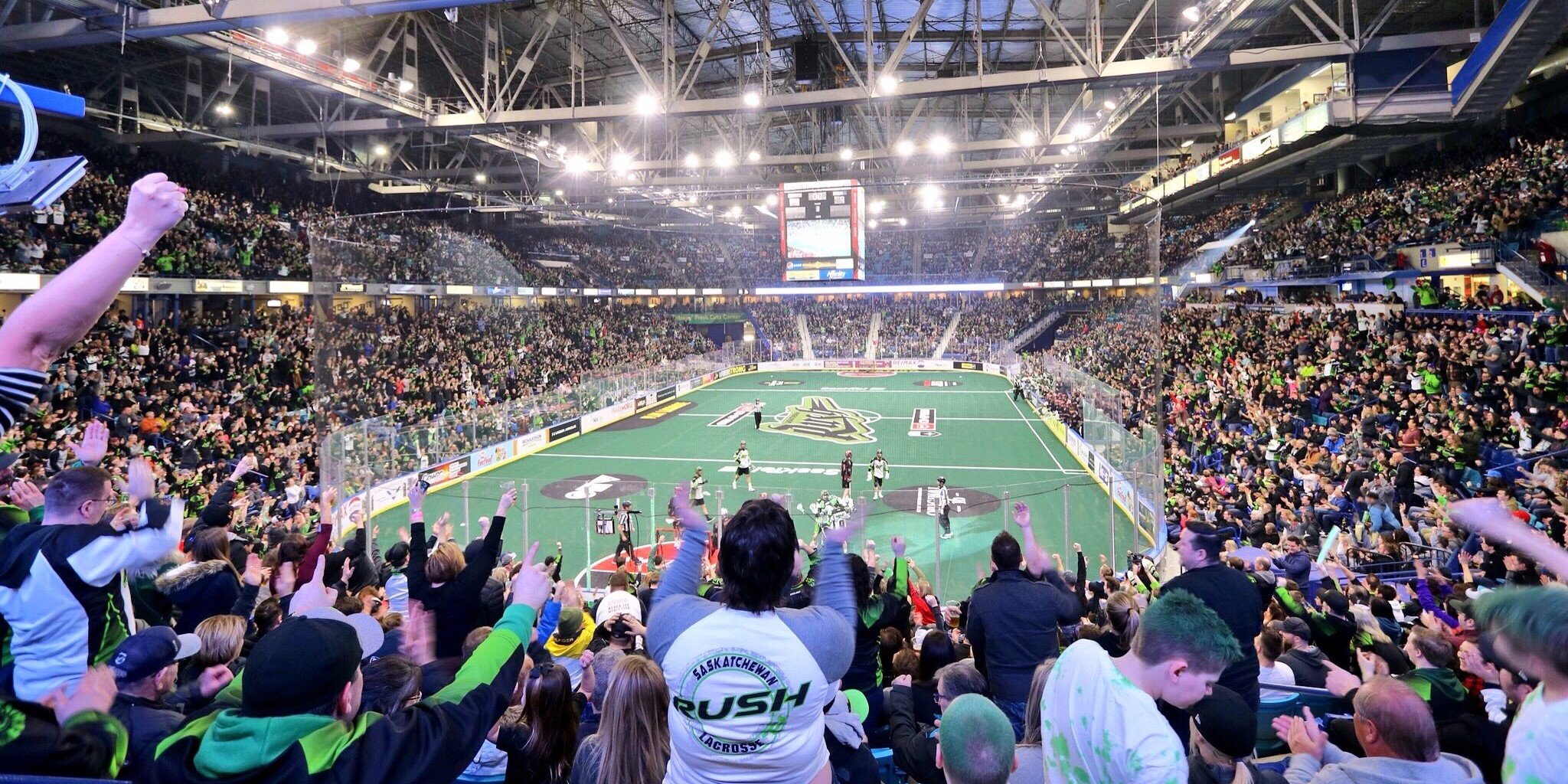 lacross game indoor stadium with cheering crowd