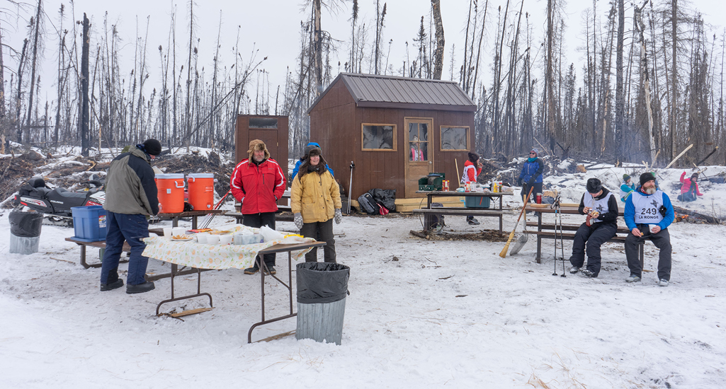 A group of volunteers help fuel hungry skiers at the Don Allen Saskaloppet near La Ronge Saskatchewan