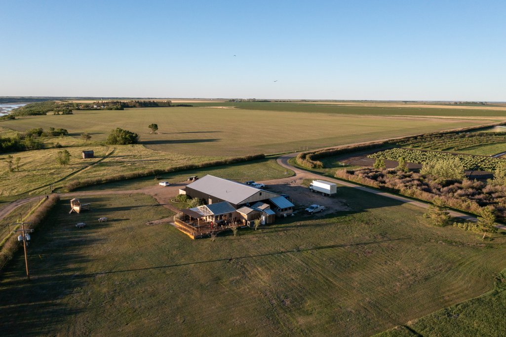 aerial picture of wolf willow winery on a clear blue sky day