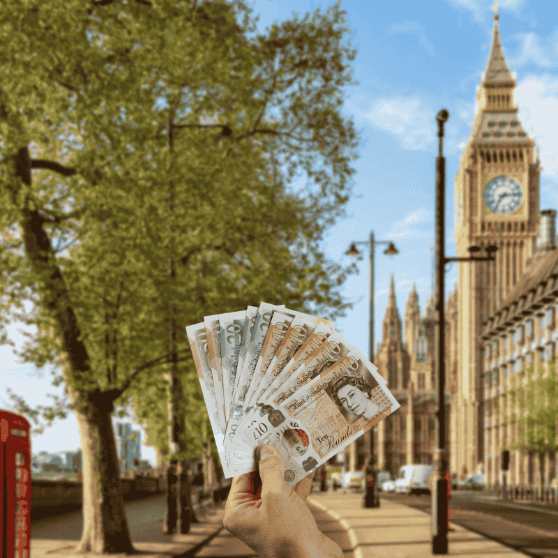 British Pound Sterling (GBP) notes in London with - Big Ben