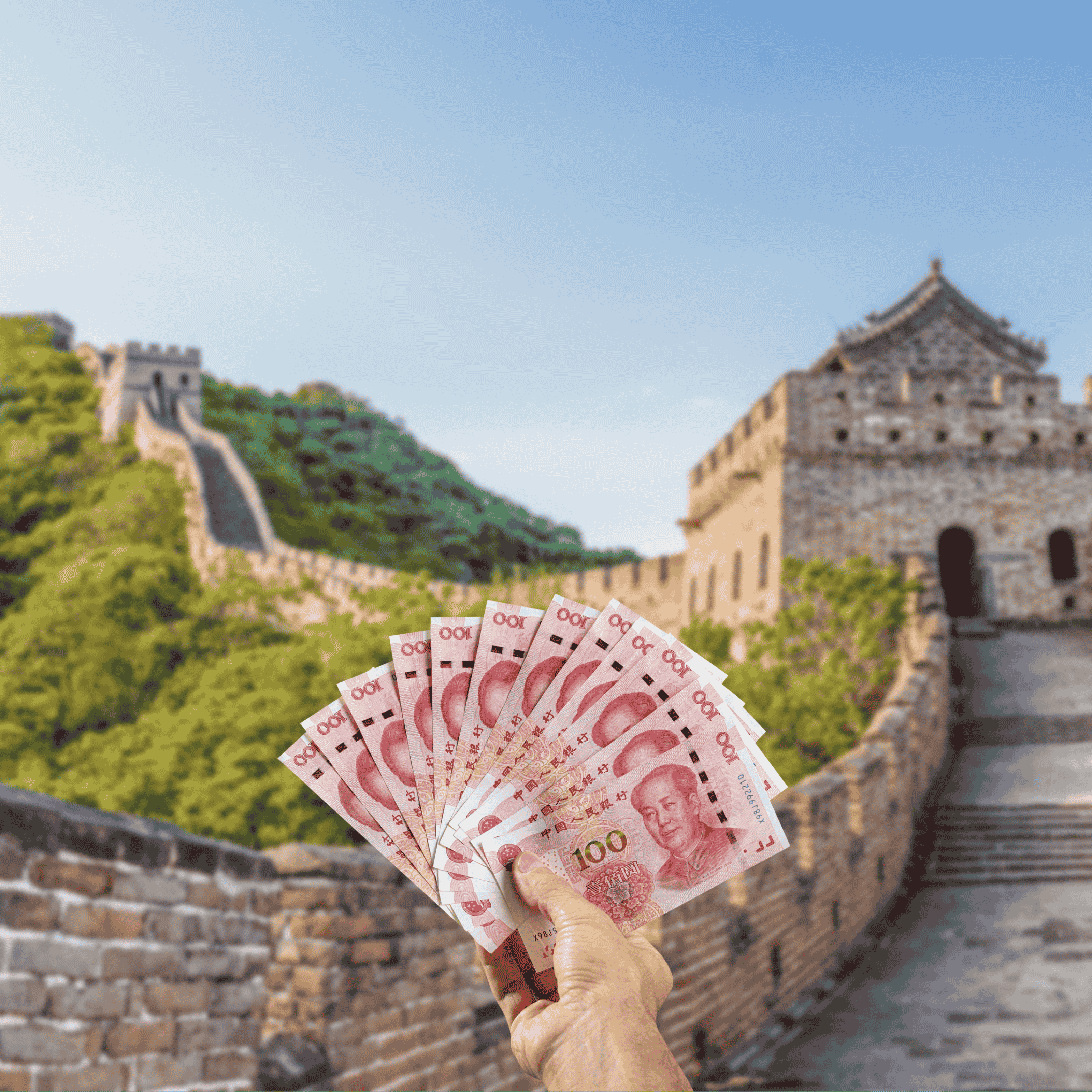 Traveller holding Chinese Yuan (CNY) currency in front of the Great Wall of China