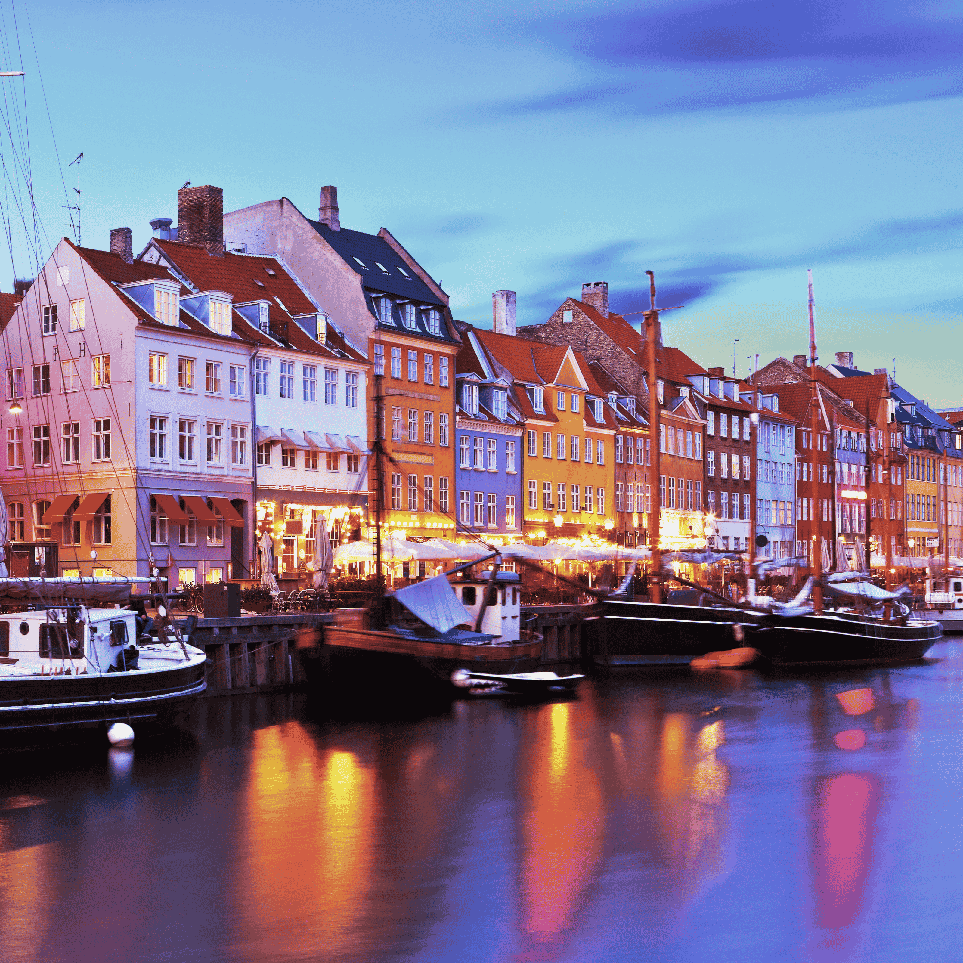 Copenhagen houses overlooking water at dusk