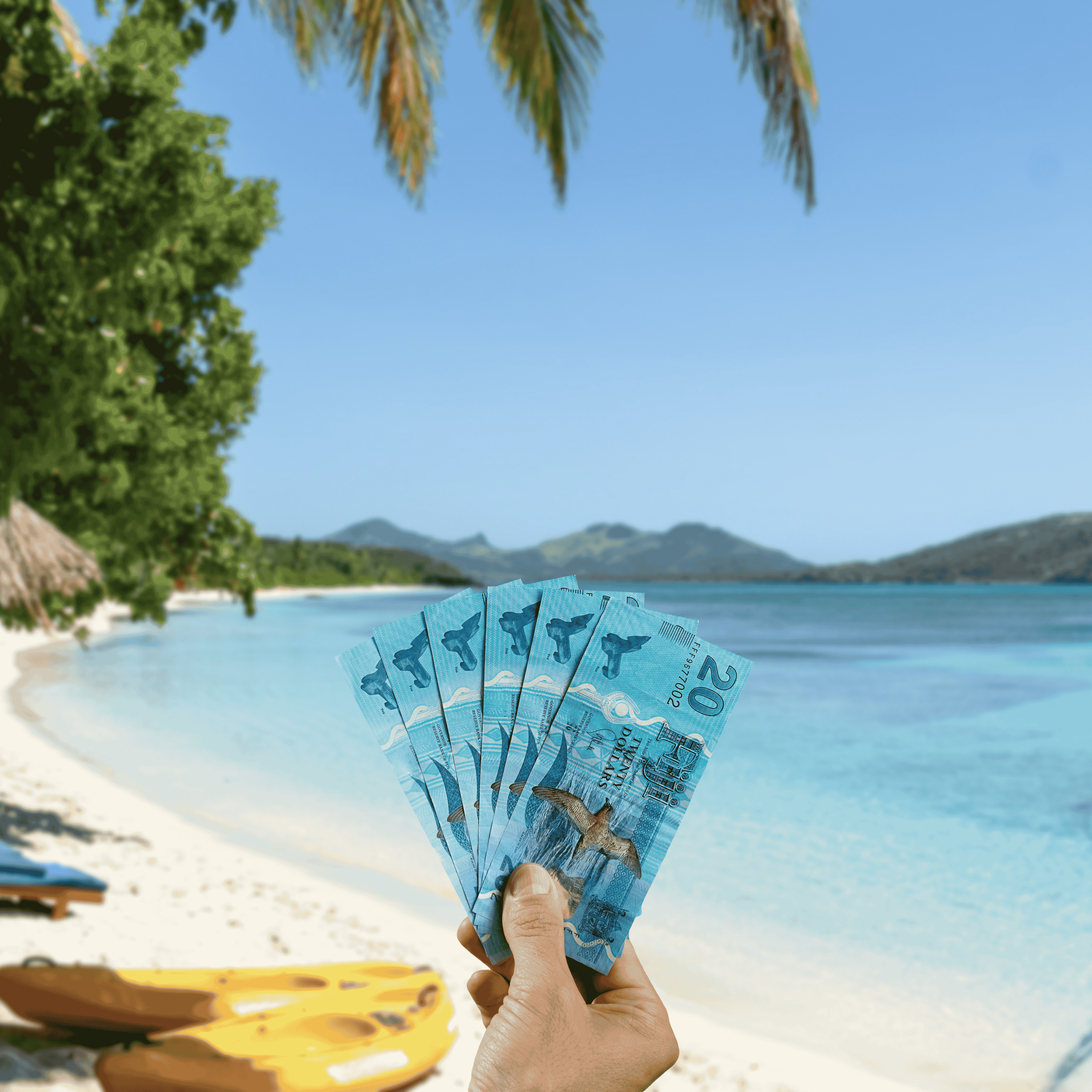 Traveller holding Fijian Dollars (FJD) currency in front of clear blue beach in Fiji