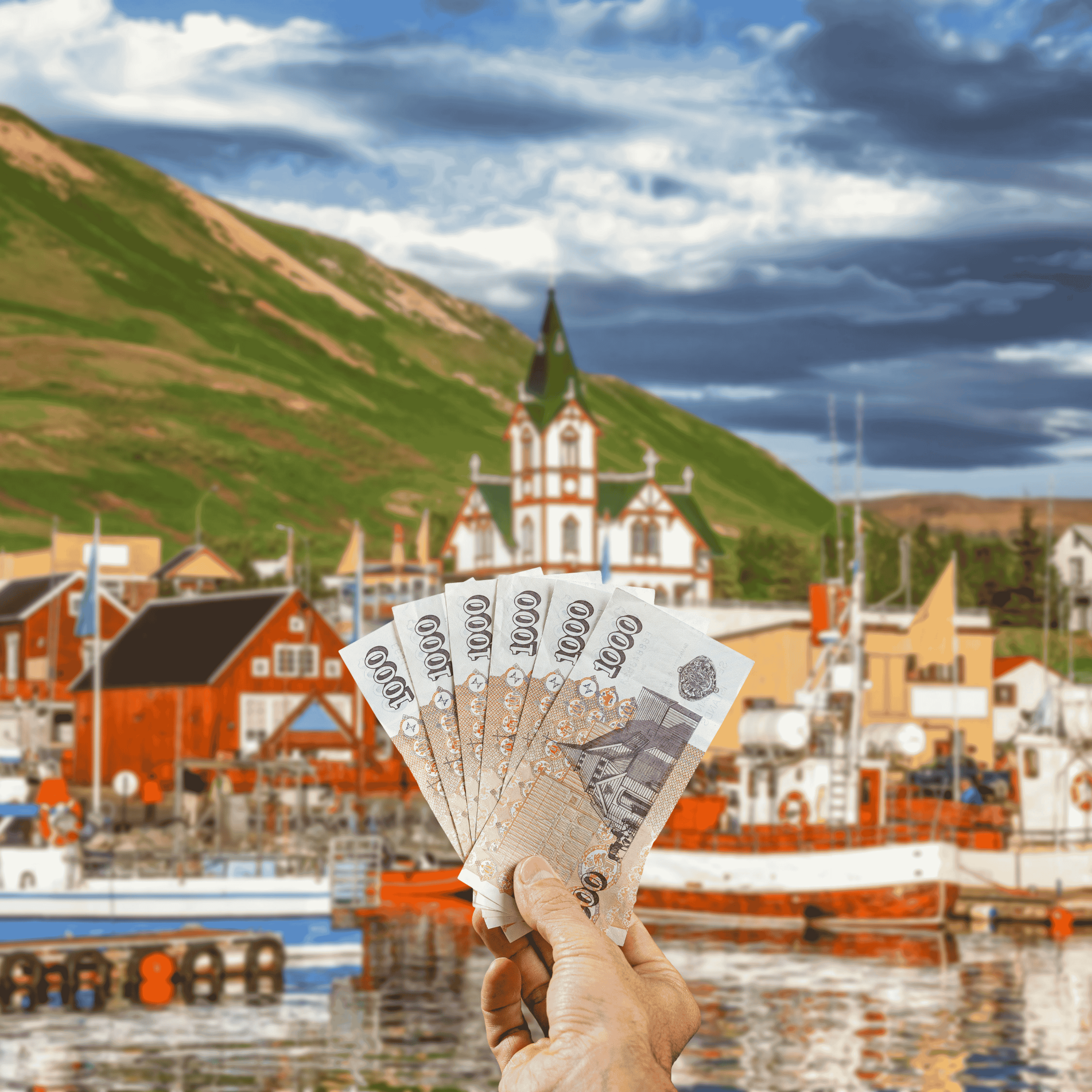 Traveller holding Icelandic Krona (ISK) currency in front view of Reykjavík, Iceland