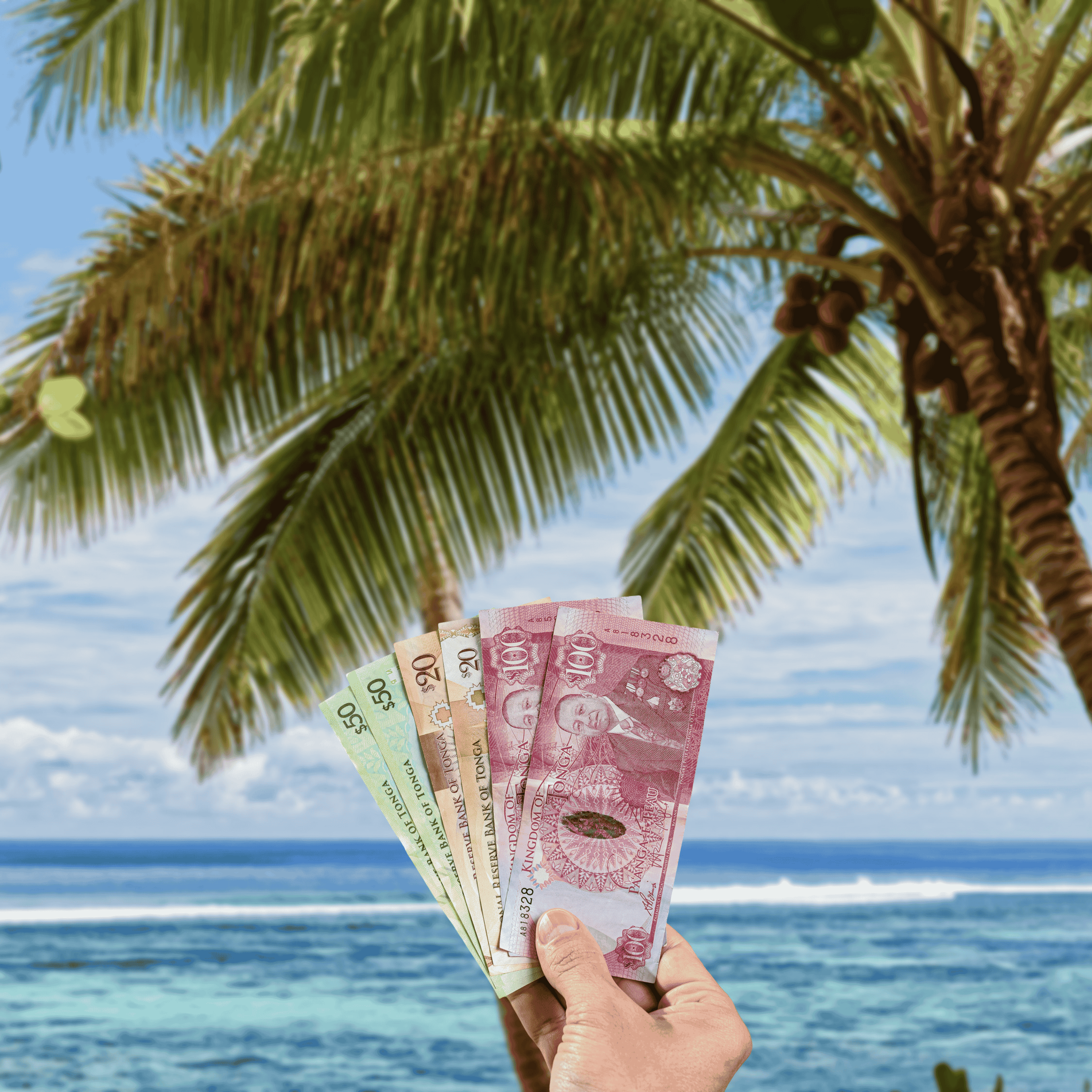 Traveller holding Tongan Pa'anga (TOP) currency in front beach in Tonga