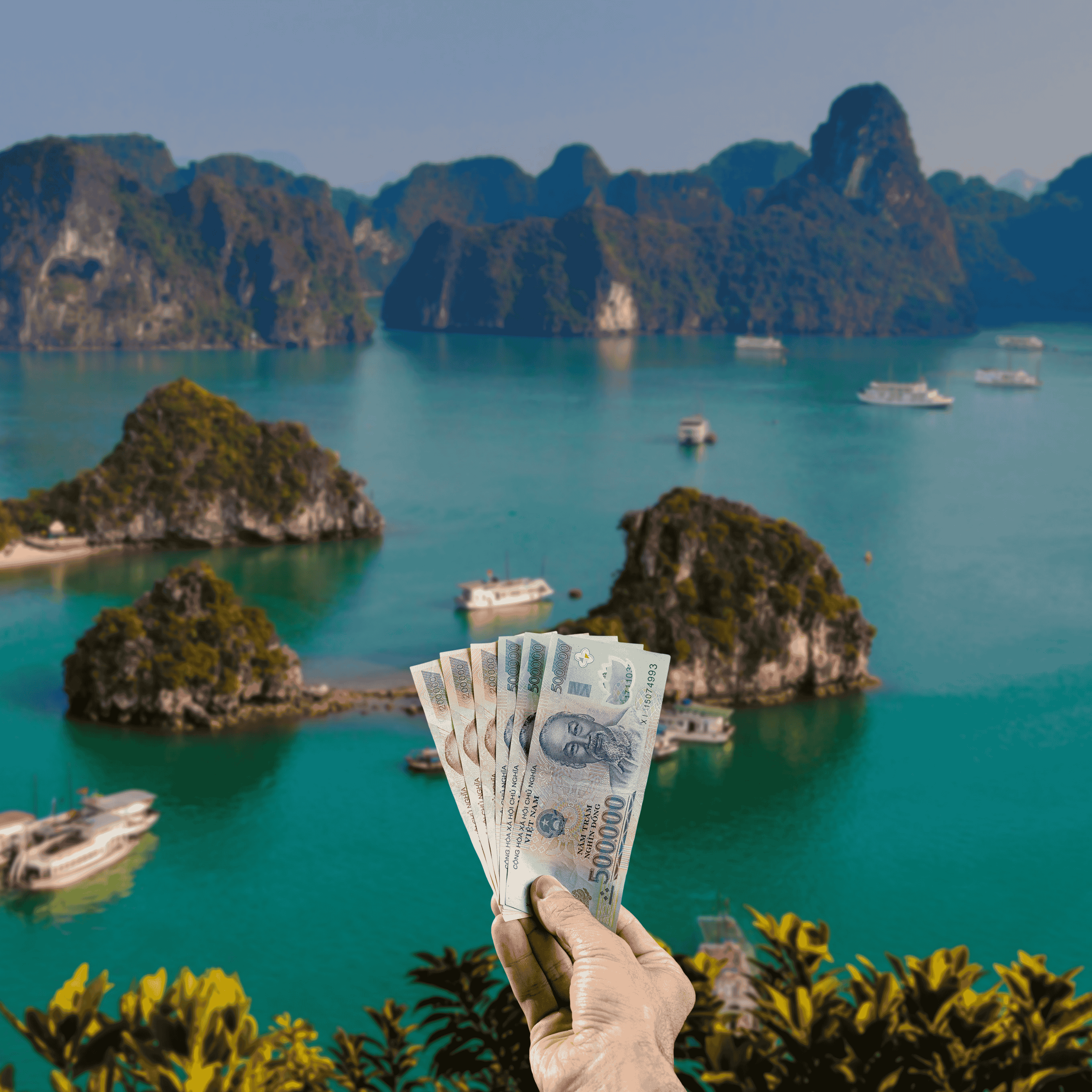 Traveller holding Vietnamese Dong (VND) currency in front of Ha Long Bay, near Hanoi, in Vietnam
