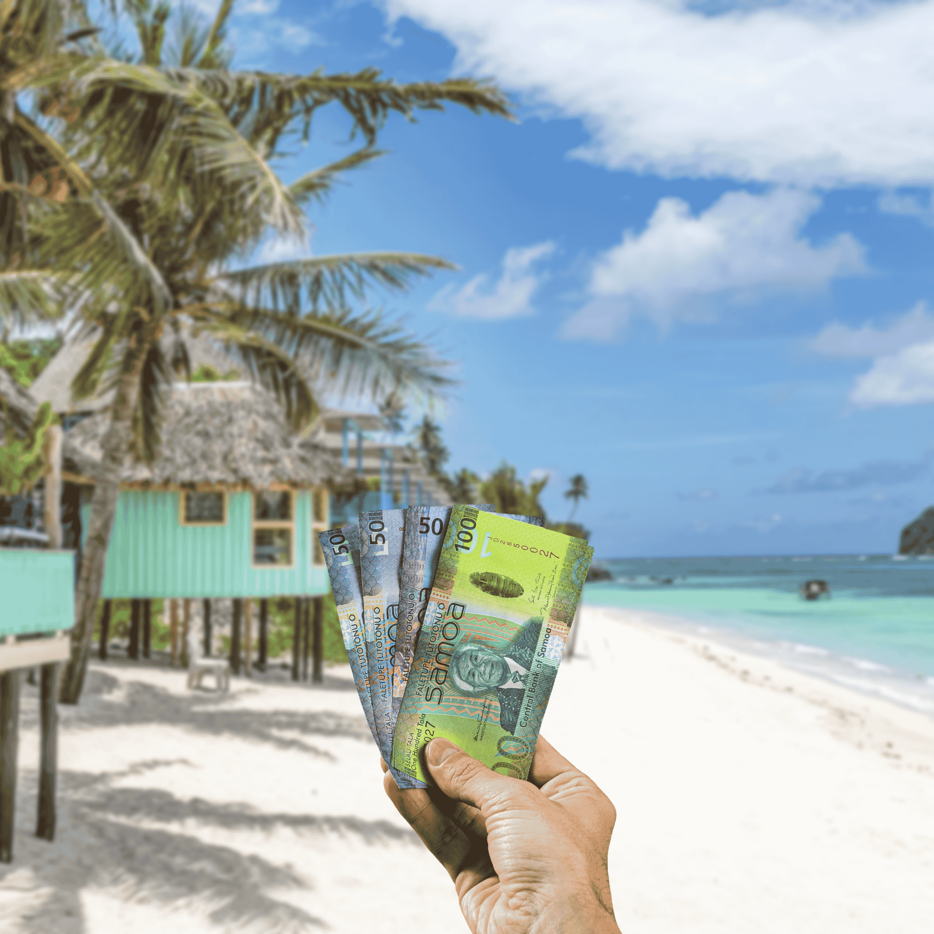 Traveller holding Samoan Tala (WST) currency in front of view of beach shacks in Samoa