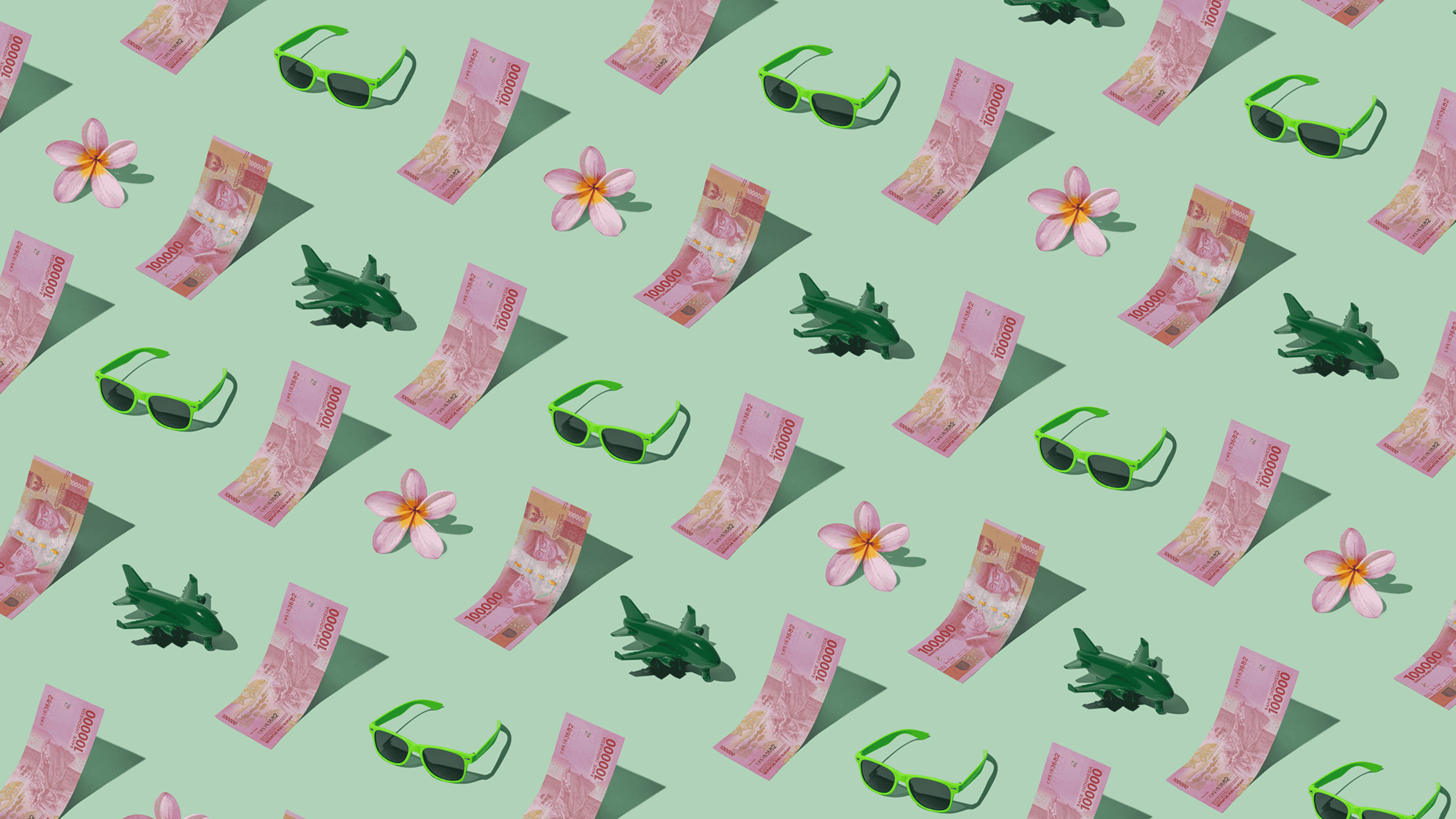 Indonesian Rupiah (IDR) currency banknotes laid out in a repeating playful pattern with a green plane, green sunglasses, and frangipani flower for Travel Money Oz.