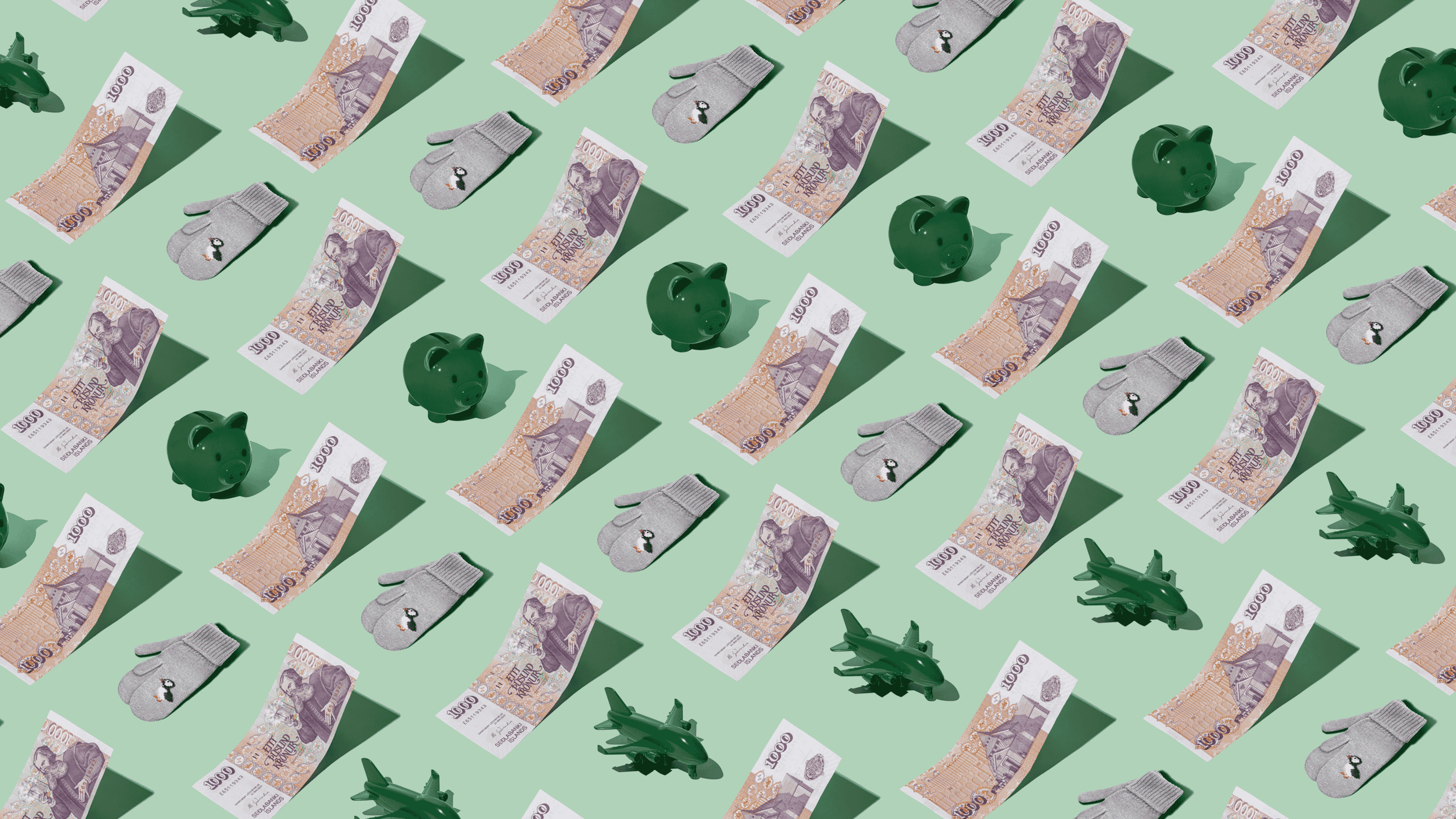 Icelandic Krona (ISK) currency banknotes laid out in a repeating playful pattern with a green piggybank, green plane, and puffin mittens for Travel Money Oz.