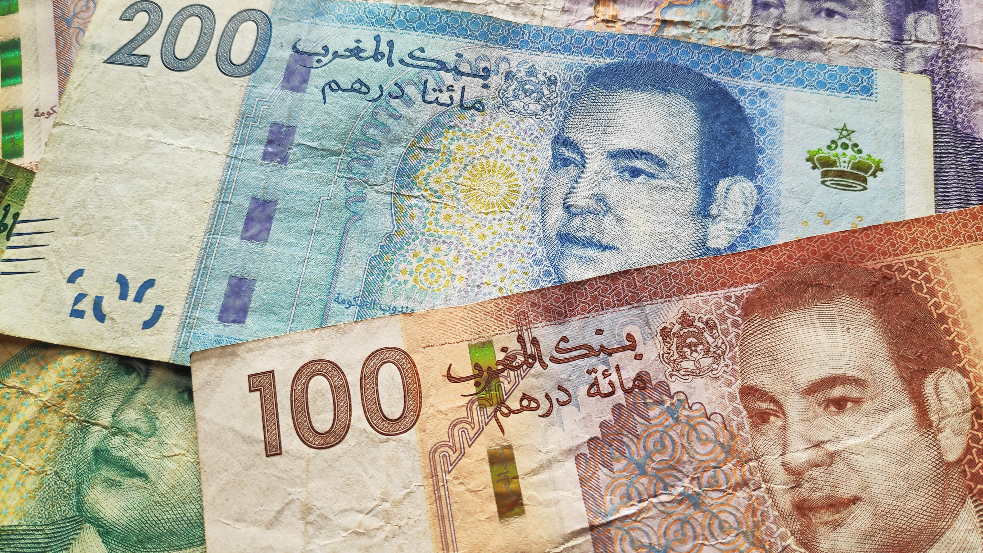 Moroccan currency banknote and coins