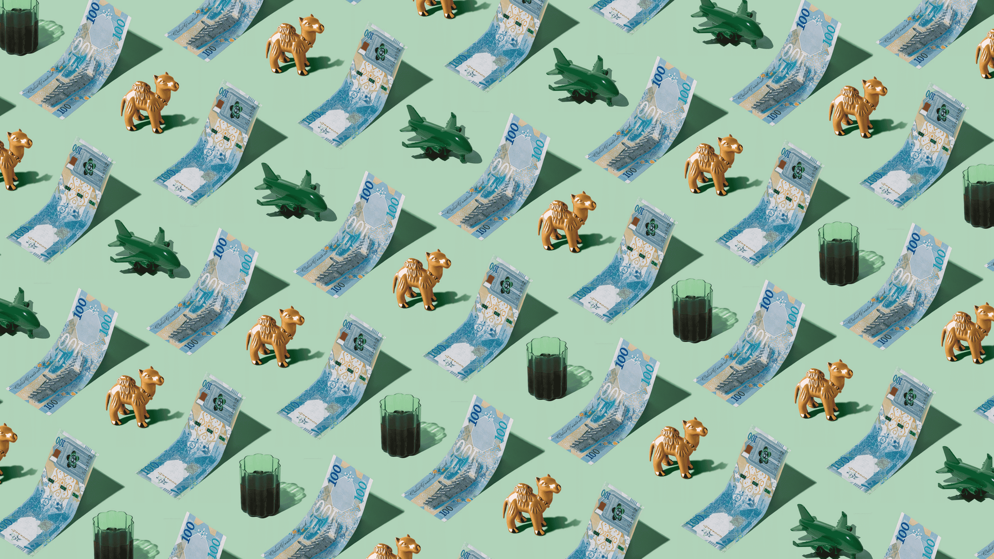 Qatari Riyal (QAR) currency banknotes laid out in a playful pattern with a green plane, tea, and camel figurine for Travel Money Oz.