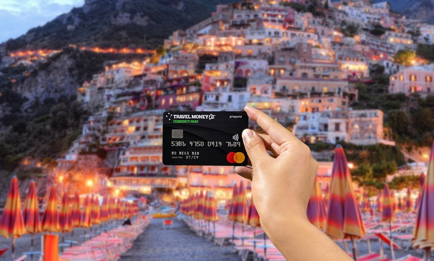 Using Currency Pass travel money card in Europe, featuring Positano in Italy