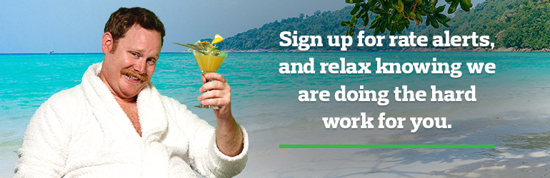 Man enjoying cocktail on beach