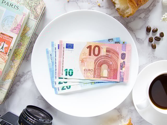 Europe currency with diary and coffee