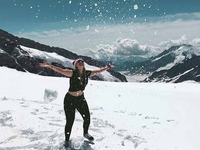 Girl on snowy mountain