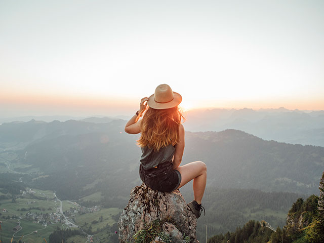 girl overlooking mountains