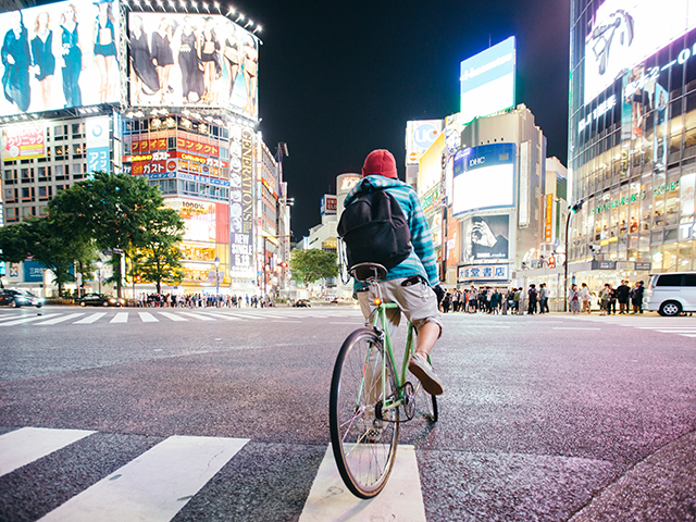 Boy on bike in Tokyo