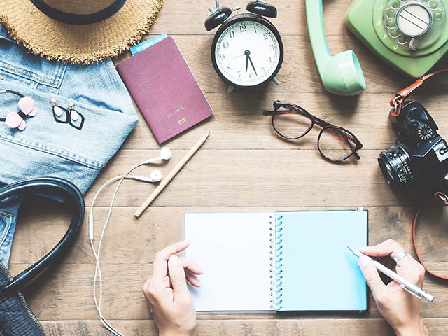 Flatlay of travel essentials