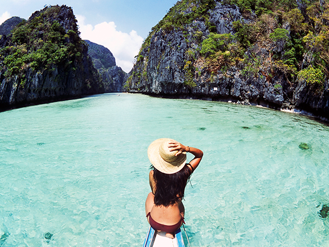 Girl on a boat in the Philippines