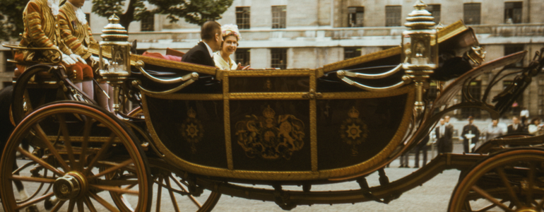 Young Queen Elizabeth II in horse-drawn carriage