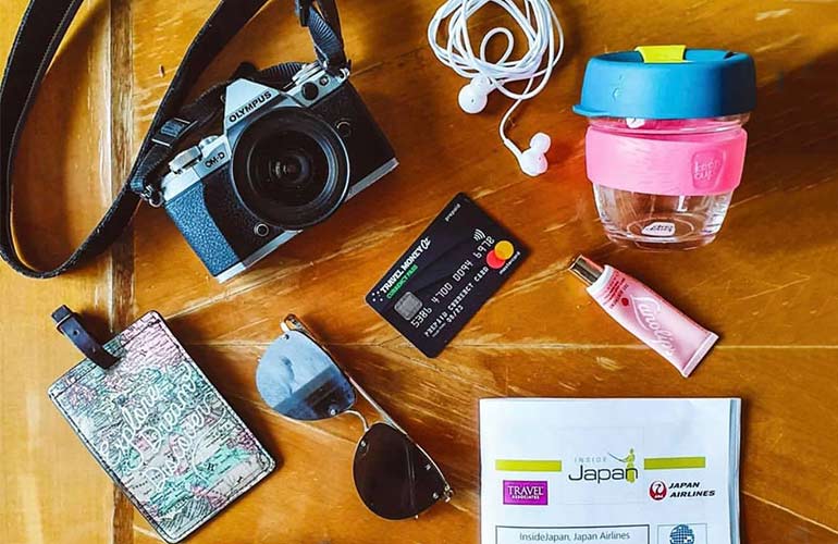 Currency Pass flatlay