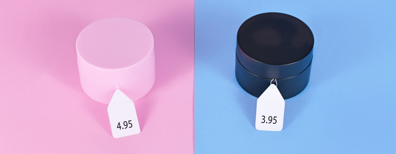 The image is split into one side being pink (representing women), and the other blue (to represent men). The same item (a round block) is on both sides, but on the women The image is split into one side being pink (representing women), and the other blue (to represent men). The same item (a round block) is on both sides, but on the women