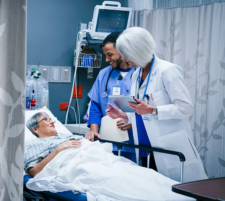 Happy child playing in the park during autumn, with leaves falling around them and smiling on a sunny afternoon.