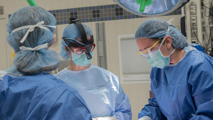 Nora Jaskowiak, MD, in surgery with team