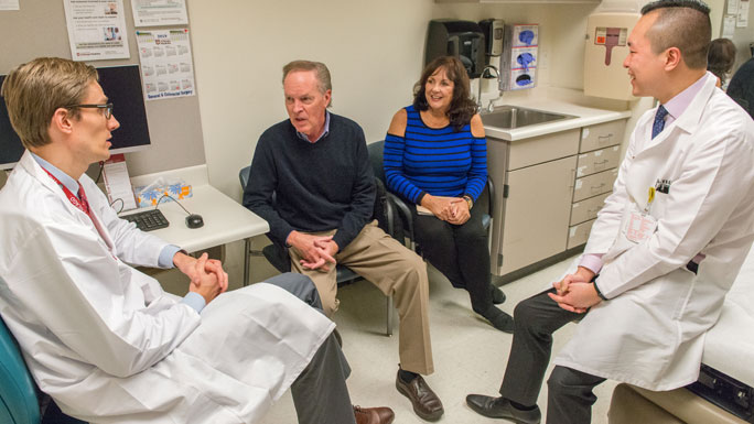 left to right: Endocrine surgeon Xavier Keutgen, MD, neuroendocrine tumor patient James Whitmer, wife Mary Whitmer, medical oncologist Andy Liao, MD
