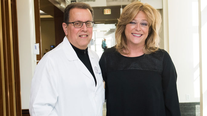Surgeon Mitchell Posner, MD, and patient Karen Bluemke, who had surgery for pancreatic cancer