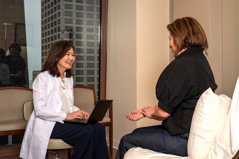 Harper physician with patient