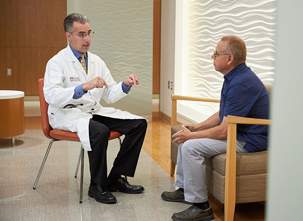 Dr. Russell Cohen with an IBD patient