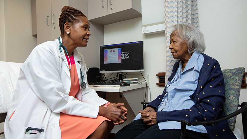 Shellie Williams, MD with a female patient