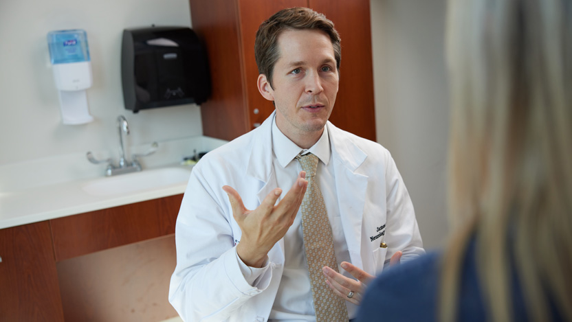  Neurologist James Siegler, MD with a patient. Dr. Siegler treats stroke and neurovascular conditions.