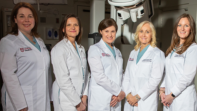 Urogynecologists in the OR where they perform pelvic surgery procedures