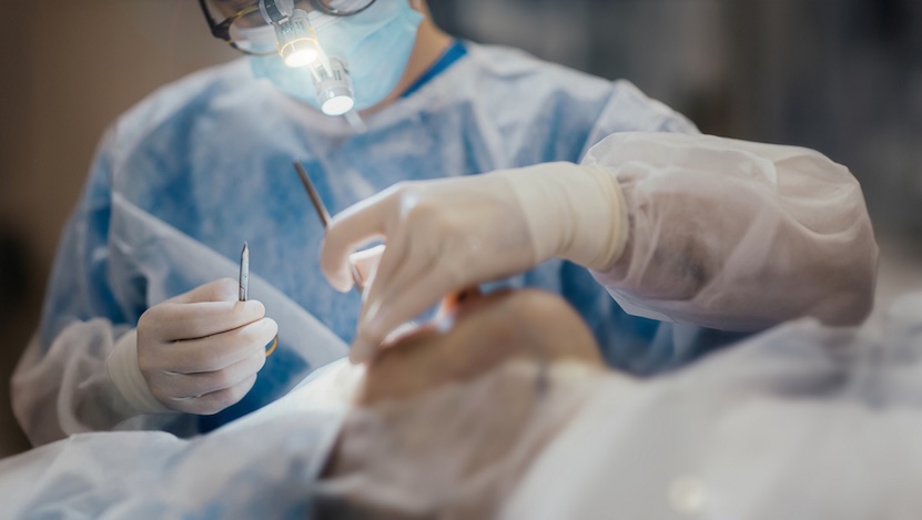 surgeon providing facial surgery