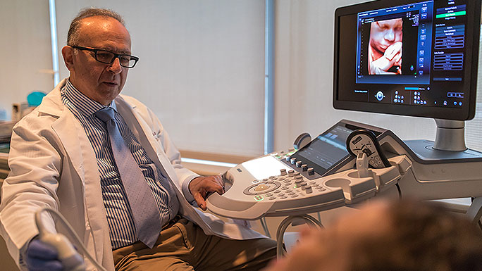 Obstetric ultrasound expert Jacques Abramowicz, MD, performs a fetal imaging procedure
