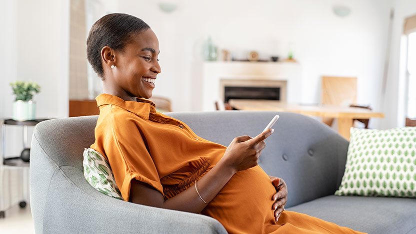 Pregnant woman using pregnancy app