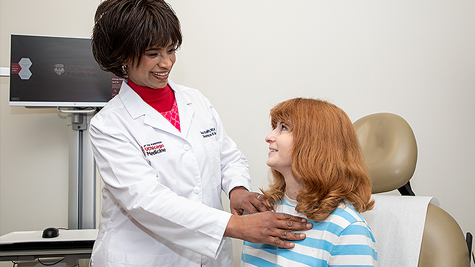Reproductive endocrinologist Dr. Sana Salih examines a patient