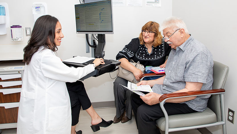 Ben Guajardo and his wife, Juanita, ask their clinician questions