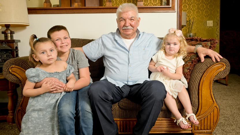 Bensabio Guajardo with his three grandchildren