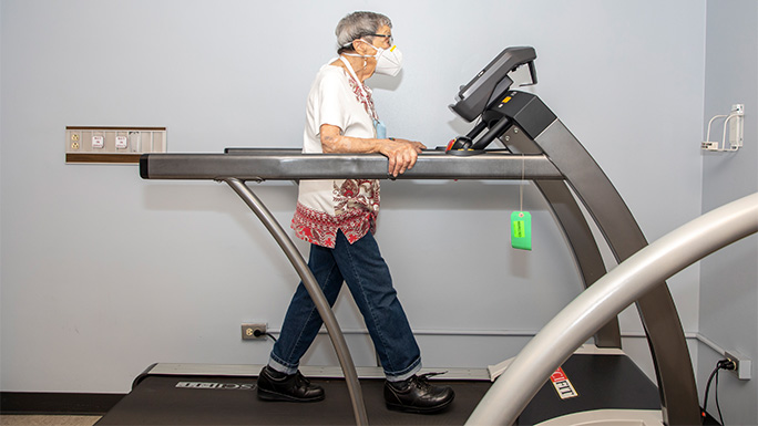 Image of Beatrice Lumpkin walking on a treadmill