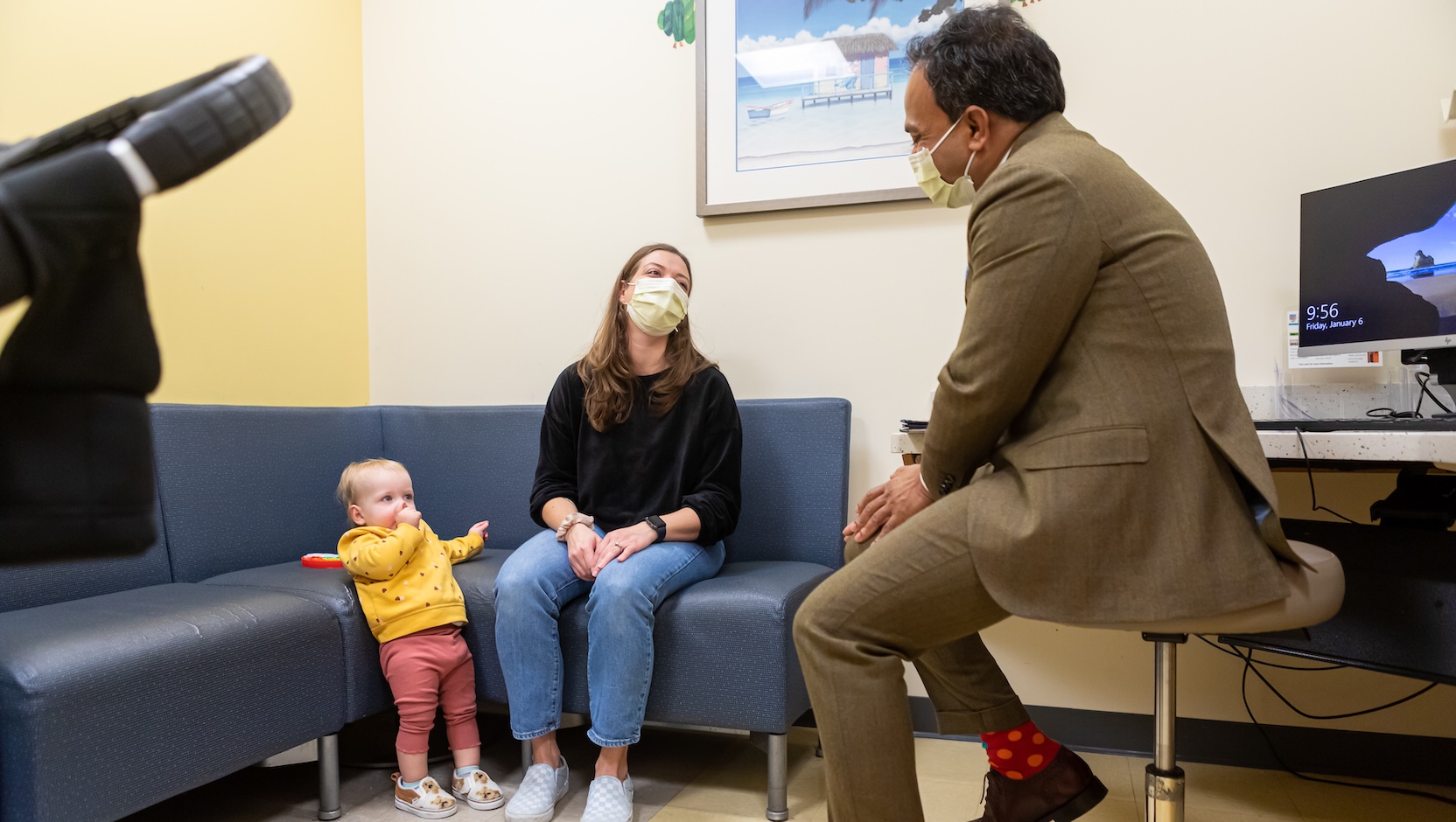 Mohan S. Gundeti, MD, with a young patient at UChicago Medicine Comer Children's Hospital